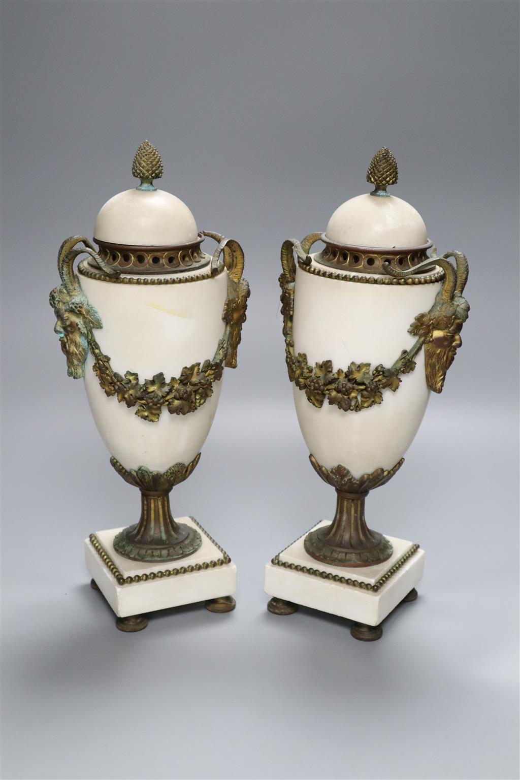 A pair of white marble and ormolu-mounted urns, in neo-classical style, with covers, 31cm